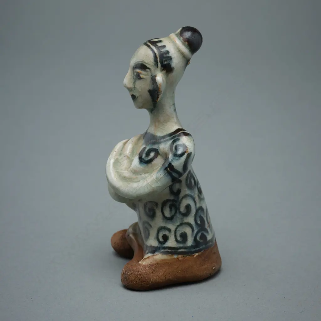 A Sawankhalok stoneware figure (tukatha), Image 1++